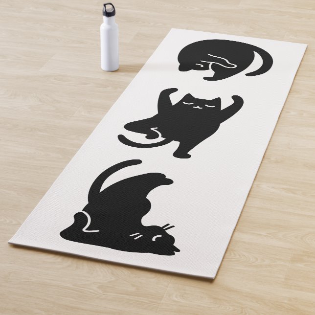 Cute black cat doing yoga,  yoga mat (In Situ)