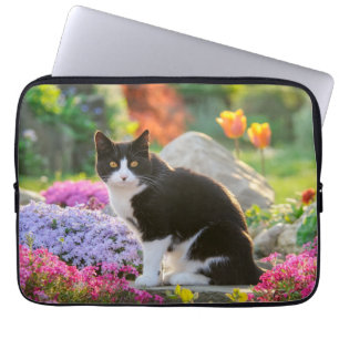 Cute Black White Cat in a Colourful Flowery Garden Laptop Sleeve