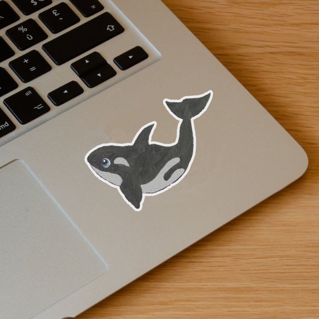 Cute Black White Killer Whale Blue Eyes (Cute cartoon style black white killer whale with blue eyes on vinyl sticker.)