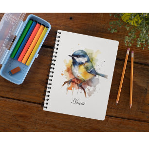 Cute bluetit sitting on a branch  planner