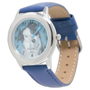 cute border collie dog with blue teddy bear watch