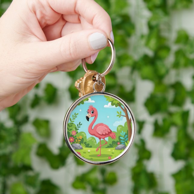 Cute bright pink flamingo in garden key ring (Hand)