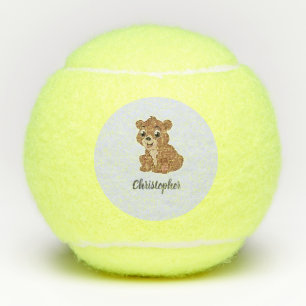 Cute brown bear blue tennis balls
