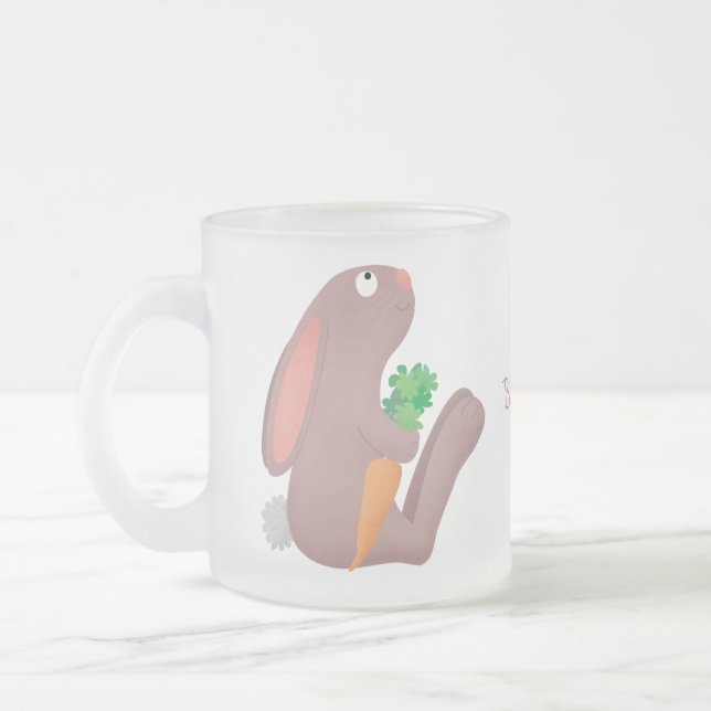 Cute bunny rabbit sitting with carrot cartoon frosted glass coffee mug (Left)