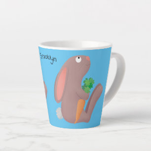 Cute bunny rabbit sitting with carrot cartoon latte mug