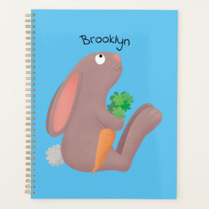 Cute bunny rabbit sitting with carrot cartoon planner