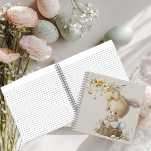 cute bunny with Easter eggs in a flower meadow Notebook