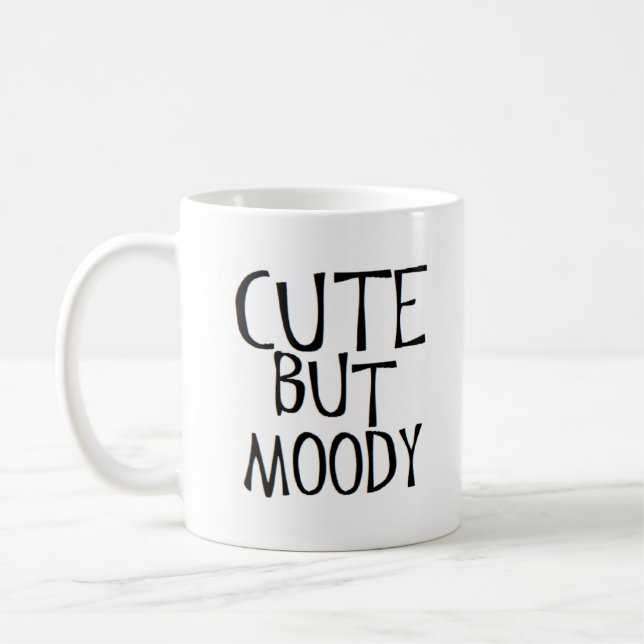 cute but moody coffee mug (Left)