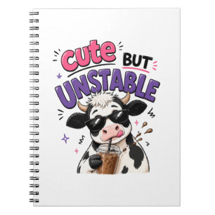 Cute but unstable cow with iced coffee notebook