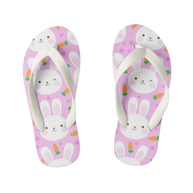Cute cartoon bunnies and carrots on pink pattern kid's flip flops (Footbed)