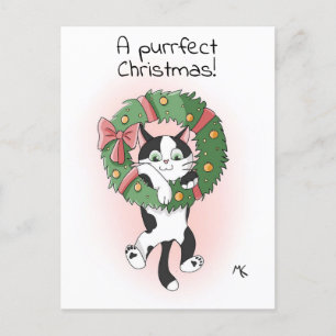 Cute Cartoon Cat Dangling from a Christmas Wreath Holiday Postcard