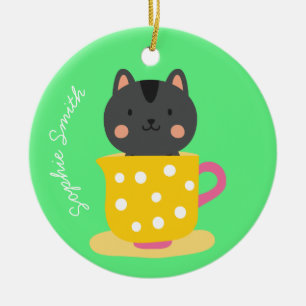Cute cat in teacup cartoon on mint ceramic tree decoration