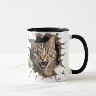 cute cat looking out from a wall mug