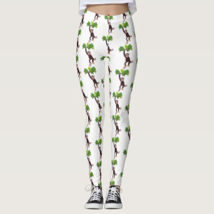 Cute chimpanzee in jungle hanging cartoon leggings
