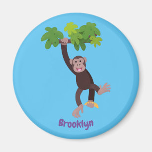 Cute chimpanzee in jungle hanging cartoon magnet