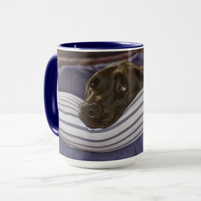 Cute Chocolate Labrador Retriever on Purple Bed Mug (Front Left)