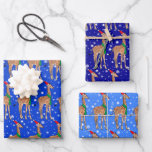 Cute Christmas Baby Giraffe in a Santa Hat Wrapping Paper Sheet<br><div class="desc">This cute design features an illustration of a baby giraffe wearing a Santa hat and a green scarf. A field of snowflakes completes the holiday theme. The blue backgrounds can be changed to the colors of your choice; click on the "Edit Design" button and proceed.</div>