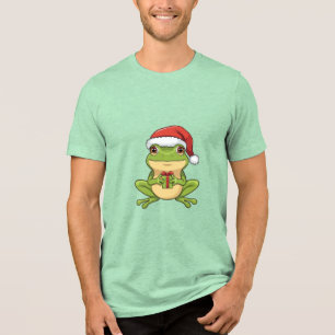 Cute Christmas Frog with Santa Hat Holding  Gift - Tri-Blend Shirt
