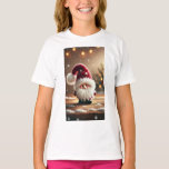 Cute Christmas Santa Gnome T-Shirt<br><div class="desc">Bring festive cheer to your holidays with this adorable Christmas Santa gnome design. With a fluffy white beard, rosy cheeks, and a cosy red hat decorated with snowflakes, this cute gnome captures the true magic of Christmas. The snowy background and warm holiday lights make it a perfect seasonal artwork that...</div>