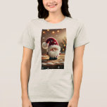 Cute Christmas Santa Gnome Tri-Blend Shirt<br><div class="desc">Bring festive cheer to your holidays with this adorable Christmas Santa gnome design. With a fluffy white beard, rosy cheeks, and a cosy red hat decorated with snowflakes, this cute gnome captures the true magic of Christmas. The snowy background and warm holiday lights make it a perfect seasonal artwork that...</div>