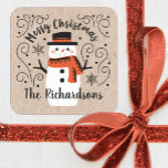 Cute Christmas Winter Snowman Square Sticker<br><div class="desc">A pretty personalised Christmas Sticker with the words Merry Christmas and a cute snowman on a kraft coloured background. Great for putting on your baked holiday treats,  presents,  Christmas Cards,  and more. Designed for you by Blackberry Boulevard.</div>