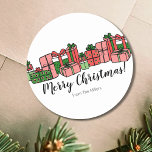 Cute Colourful Christmas Classic Round Sticker<br><div class="desc">Wish everyone a very Merry Christmas with this cute and colourful Christmas Present themed sticker. You can change all of the font to customise it to your own sayings in addition to your family names. The colour palette includes a cheerful mix of reds, pinks, and both dark and light shades...</div>