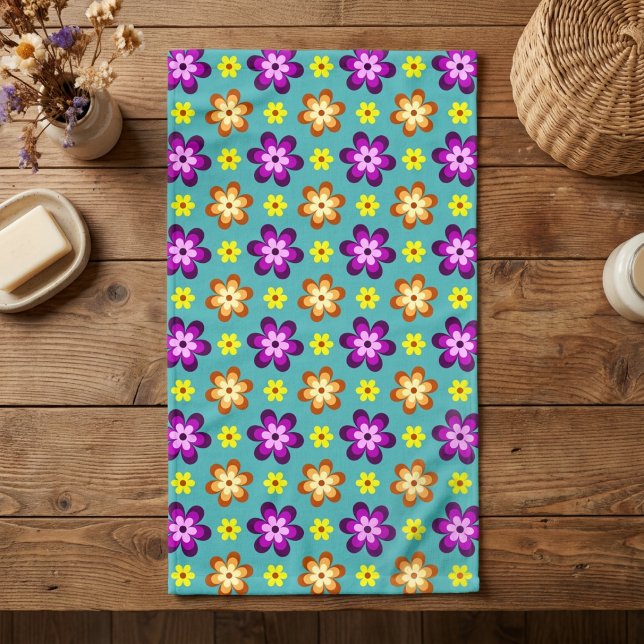 Cute Colourful Retro Flowers Hand towel (Top down view of Cute Colorful Retro Flowers Hand towel on a wooden counter.)