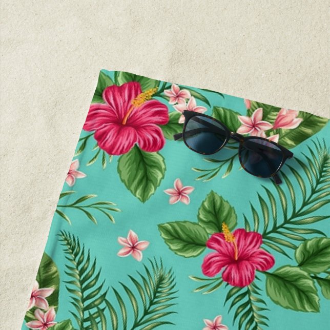 Cute Coral Tropical Hibiscus Flower On Turquoise Beach Towel (In Situ)