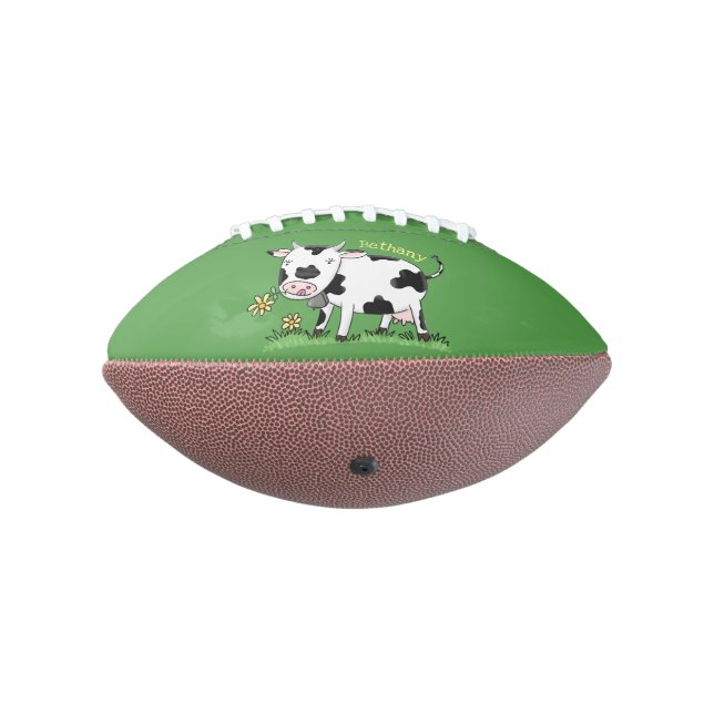 Cute cow in green field cartoon illustration american football (Rotated 270)
