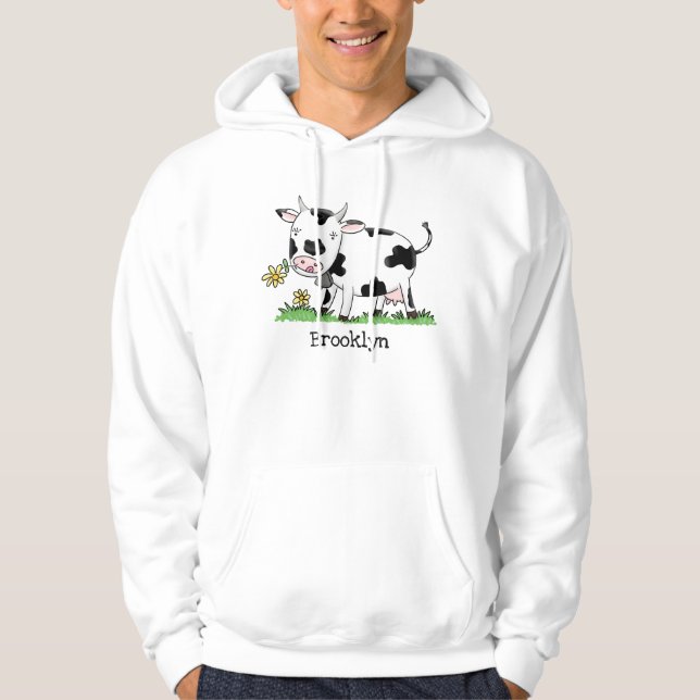 Cute cow in green field cartoon illustration hoodie (Front)