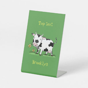 Cute cow in green field cartoon illustration pedestal sign