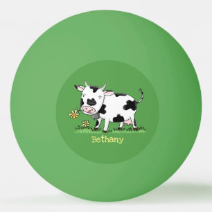 Cute cow in green field cartoon illustration ping pong ball