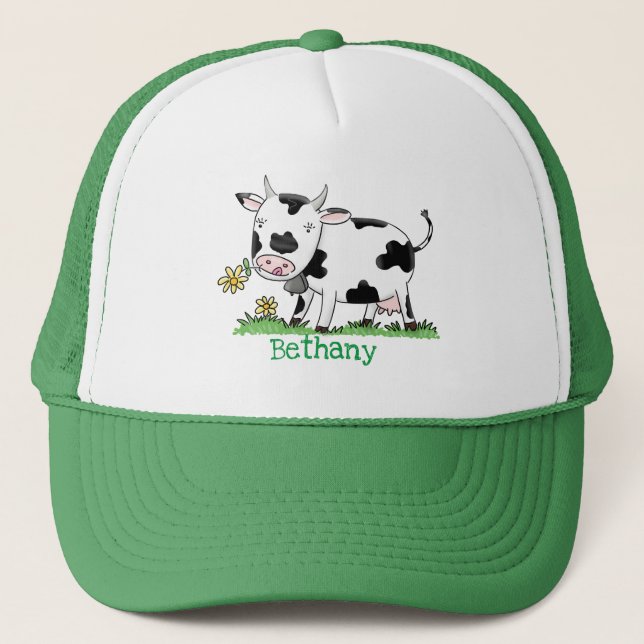 Cute cow in green field cartoon illustration trucker hat (Front)