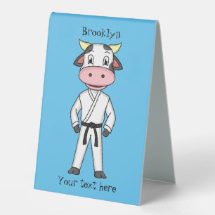 Cute cow in kung fu suit cartoon