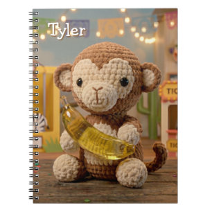 Cute Crocheted Monkey Holding a Banana at the Zoo Notebook