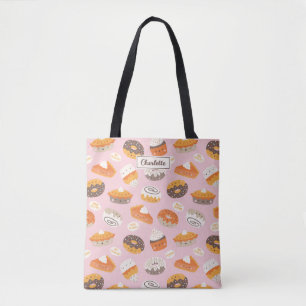 Cute cupcakes, doughnuts and pies on light pink tote bag