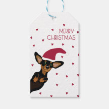 Cute Dachshund with Santa hat and heart background