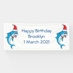 Cute dolphin with Santa hat cartoon Banner