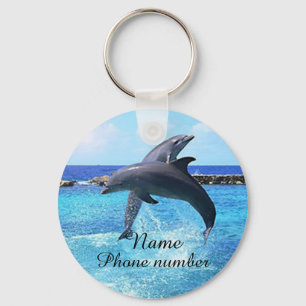 Cute dolphins in the sea key ring