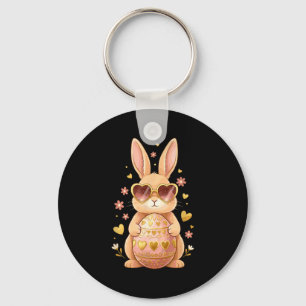 Cute easter bunny with heart sunglasses holding key ring