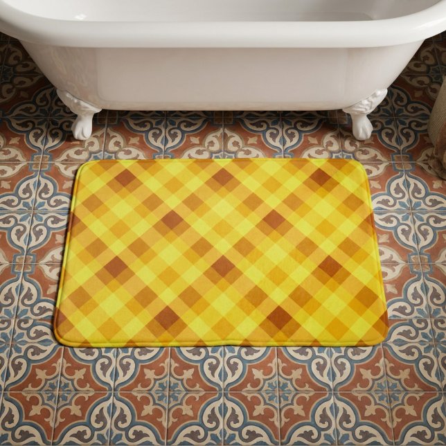 Cute Egg Yolk Yellow Plaid Medium Bath Mat (Top down view of Cute Egg Yolk Yellow Plaid Medium Bath Mat in front of bathtub on bathroom floor.)