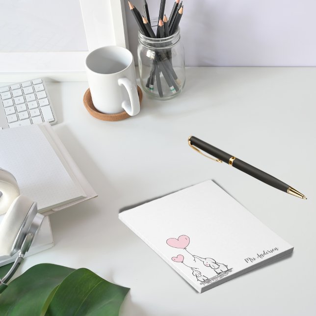 Cute elephants holding heart shaped balloons notepad (Creator Uploaded)