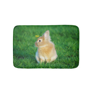 Cute Fawn Bunny Sitting in Grass Bath Mat