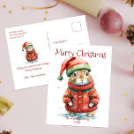 Cute Festive Hamster in Santa Hat Christmas  Holiday Postcard<br><div class="desc">This charming Christmas postcard features an adorable hamster dressed in festive holiday attire. The hamster is wearing a red coat adorned with white snowflake patterns, topped off with a classic Santa hat. The background is a soft, snowy white, enhancing the wintry theme. Above the charming image, elegant red cursive script...</div>