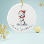 Cute First Christmas Snowman Ceramic Tree Decoration<br><div class="desc">What better way to celebrate your little one's first Christmas than by giving them a spot on the Christmas tree? This adorable ceramic ornament, featuring a little snowman in a red Santa hat and clutching a big candy cane, can be personalised with your own text to make it truly one-of-a-kind....</div>