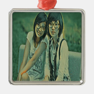 Cute friends sitting next to each other metal tree decoration