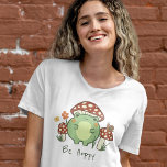 Cute Frog and Mushrooms Be Hoppy Cartoon T-Shirt<br><div class="desc">This cute T-shirt features a hand-drawn kawaii style cartoon frog, wearing a mushroom hat, along with other mushrooms, a snail, a flower, a butterfly, and grass. A colour scheme of red, lime, green, brown, orange, yellow, and peach is perfect for either the Indie or Cottage Core Aesthetic lover. Customise the...</div>
