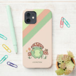 Cute Frog and Mushrooms Cartoon | Name iPhone 12 Case<br><div class="desc">This cute phone case features a hand-drawn kawaii style cartoon frog, wearing a mushroom hat, along with other mushrooms, a snail, a flower, a butterfly, and grass. A colour scheme of red, lime, green, brown, orange, yellow, and peach is perfect for either the Indie or Cottage Core Aesthetic lover. A...</div>
