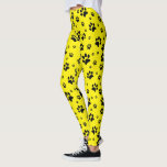 Cute Fun Black on Bright Yellow Paw Prints Leggings<br><div class="desc">These fun leggings are perfect for dog and cat lovers. They feature a cute pattern with black paw prints scattered over a bright yellow coloured background. Fun whimsical design is perfect for pet parents and animal lovers.</div>
