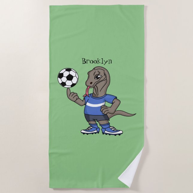 Cute funny Komodo dragon playing soccer cartoon Beach Towel (Front)
